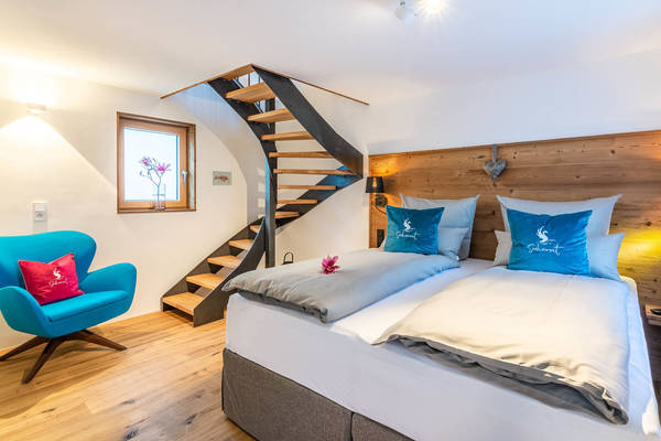 Ferienwohnung Seeheimat - Schlafzimmer mit Wendeltreppe